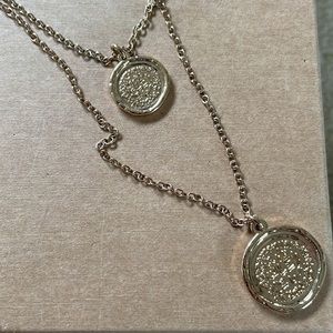 Gold tone double necklace with pendants